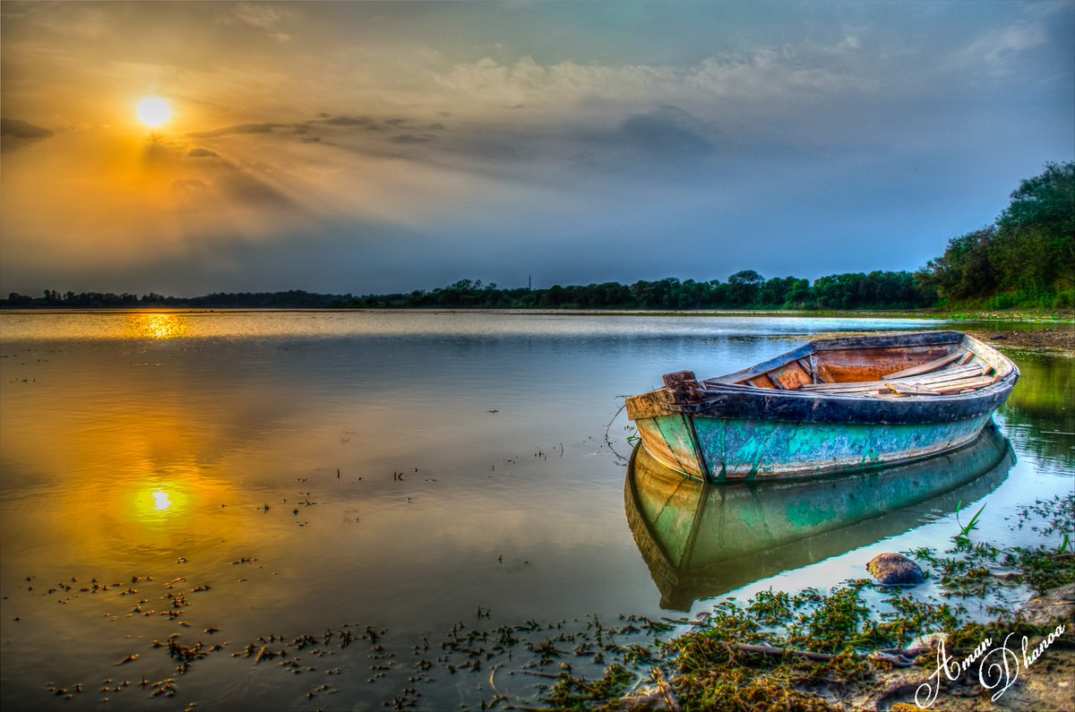 TweetByAMan's tweet image. Photo of #Sunset at #Sukhna lake in #Chandigarh 
#AmanDhanoa #photography #landscape  #boat #Sukhnalake #india #indiaphotography
