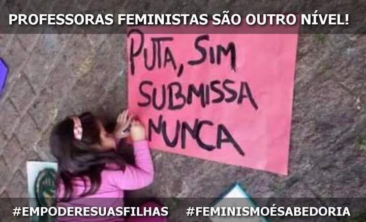 Uma criança foi levada a uma manifestação de um grupo de feministas na Av. Paulista, em São Paulo, para escrever que era puta. Nojo delas!