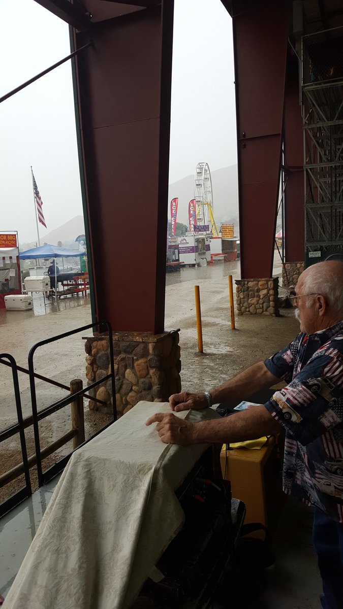 MJPogan's tweet photo. It poured today at the Norco Fair. #norcofair #socalstorm #westernexpressband https://t.co/BMC9m09WRs
