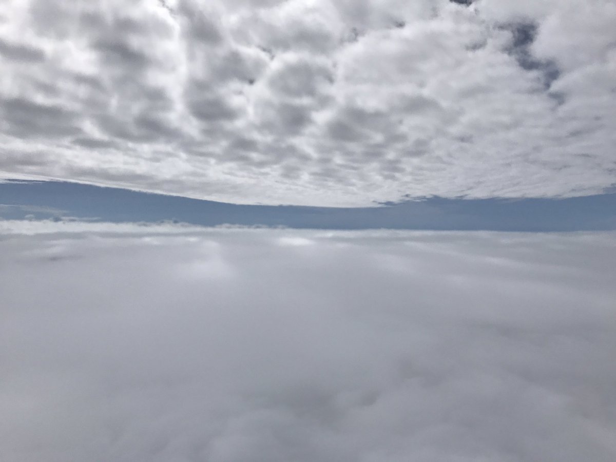 joc1954's tweet photo. Cloud below, cloud above and blue sky when flying home from #poug17. Prefer blue sky, no #cloud  please! Clouds are hostile. https://t.co/AZttkRTmFt