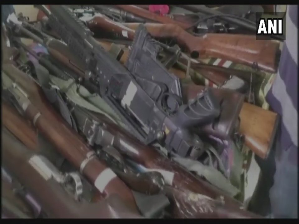 ANI's tweet photo. Haryana: Huge cache of arms recovered by Police from #DeraSachaSauda HQ in Sirsa. https://t.co/2yPVewn05L