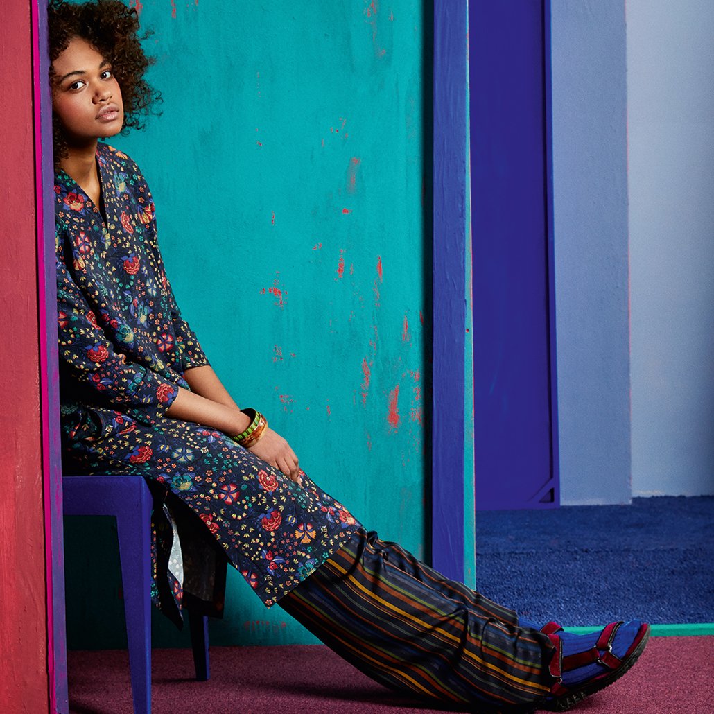 Give floral prints a modern edge by adding a graphic design to your outfit.