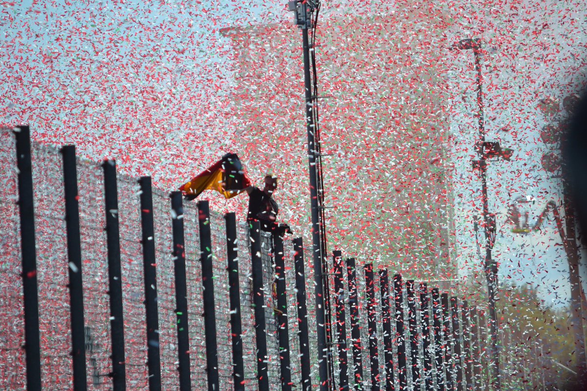UmbrellaDogArt's tweet photo. One photo that sums up the feeling of being at the Monza Grand Prix. #fanzone #formulaonegp https://t.co/u1uWoBeSV2