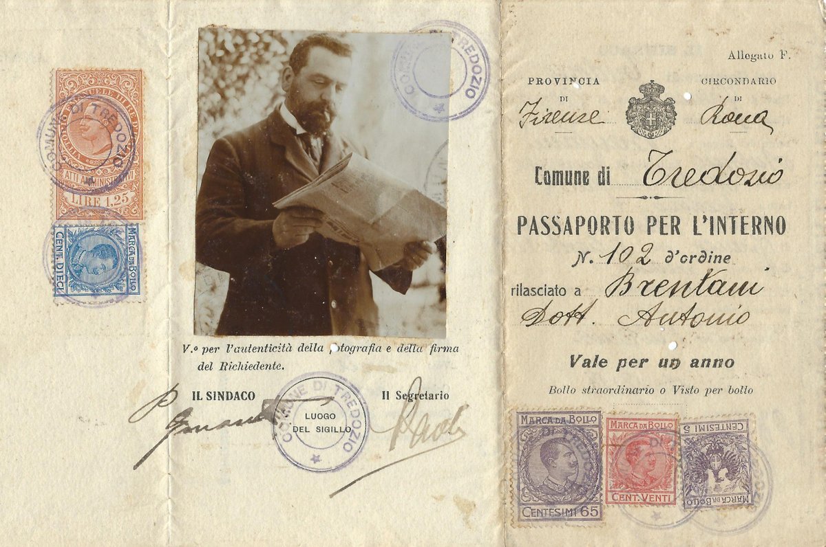 one of the things I love about old passports is the free attitude of photos that were accepted to be used in them years ago - 1918, Italy.