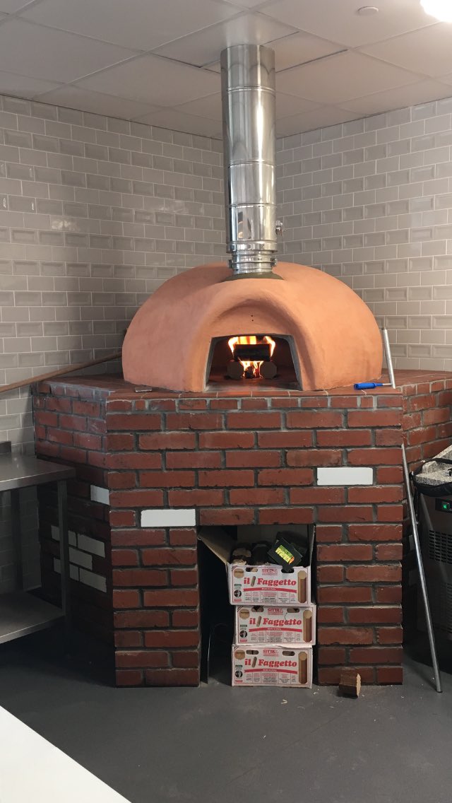 cobchef's tweet photo. All fired up @The_ChocolateQ @St_Monica_Trust #woodfiredpizzas #Bblock https://t.co/4ccaT0DWSa