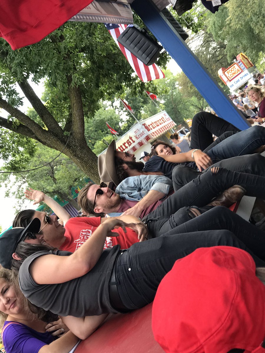 TCountrySource's tweet photo. !!! @LancoMusic taking a group picture at @K102 at the #MNSTATEFAIR // Thanks @K102 for having @LancoMusic at your booth. https://t.co/uxdsQ2Uaez