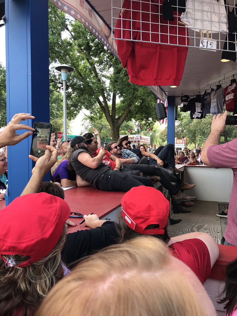 TCountrySource's tweet photo. !!! @LancoMusic taking a group picture at @K102 at the #MNSTATEFAIR // Thanks @K102 for having @LancoMusic at your booth. https://t.co/uxdsQ2Uaez