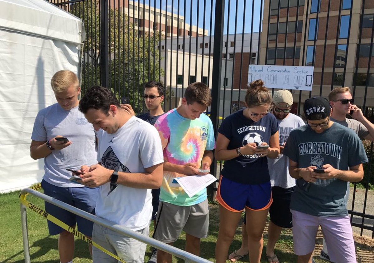 darrenrovell's tweet photo. Outstanding: It's "Millenial Day" at a @GeorgetownHoyas soccer game today, includes participation trophies & a "cell phone use only" section https://t.co/ofzVtMBrJF