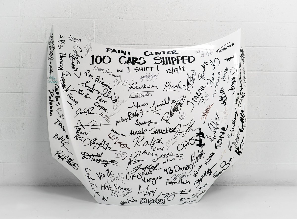 Tesla hoods signed by paint shop team to mark production milestones. Thanks to all of our teams for your work and commitment to our mission.