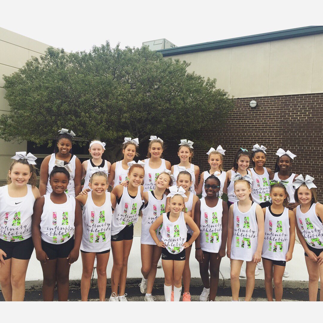 ICE_Michigan's tweet photo. Happy Labor Day from everyone at Infinity Athletics!! We had a blast at the parade today representing IA 💚🖤#infinitystrong #summertimefun https://t.co/XOAZwlloAK