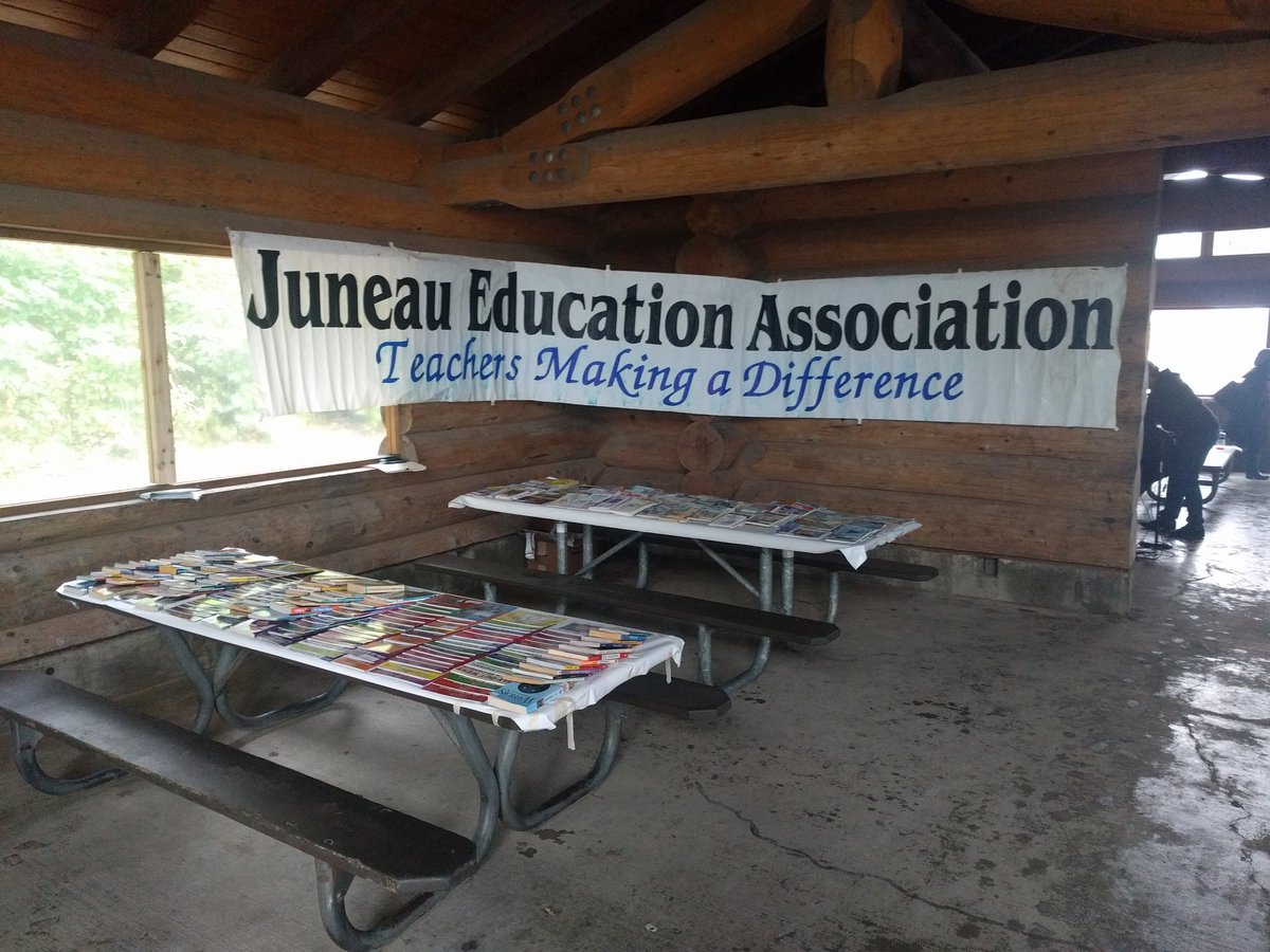JNUrain's tweet photo. #JuneauEdAssoc #freebooks at the #LaborDay picnic. @JuneauSchools https://t.co/owKH4OI07p
