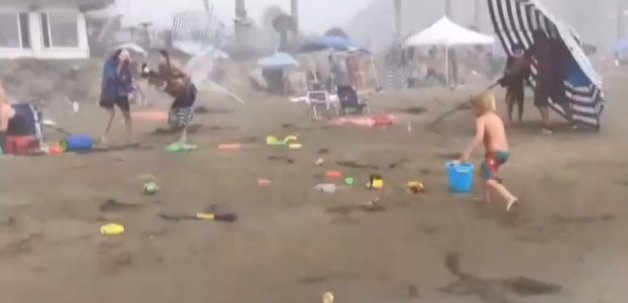 DanMarriesKOLD's tweet photo. People run for cover as a #mircoburst causes damage at a California beach. Watch the video - https://t.co/ZBcQTTgh72 https://t.co/SJLUcByr4U