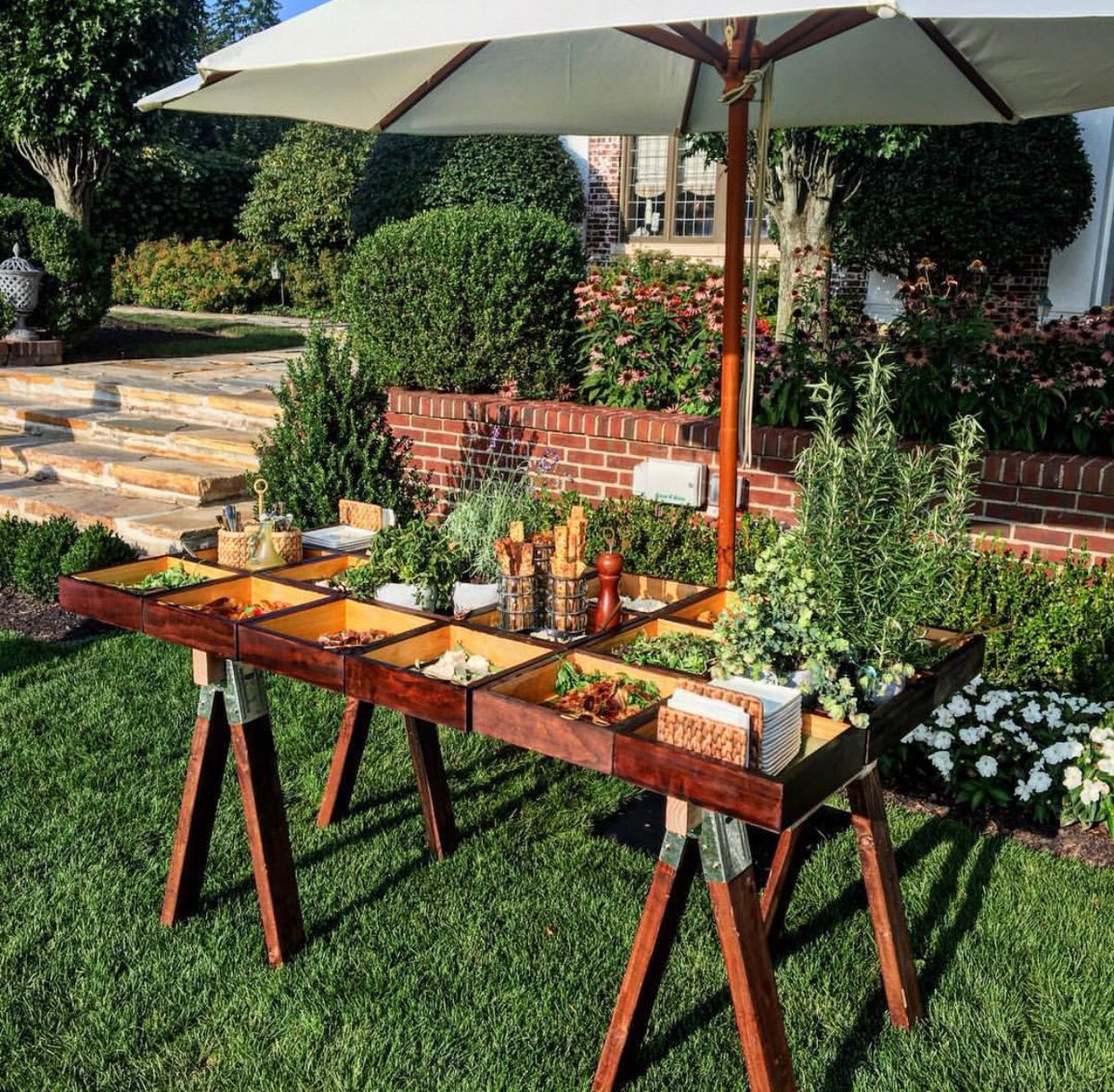 peter_callahan's tweet photo. Our buffet design with a sawhorse base! Thanks for the great photo @JZEvents #buffetstation #weddingdecor #saladbar https://t.co/nmBCOwcoqS