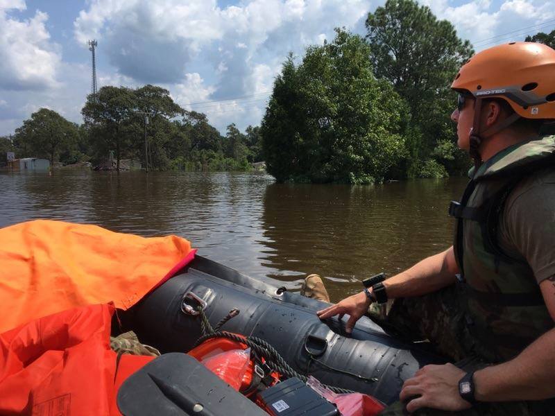 TXMilitary's tweet photo. #PhotosFromTheField: #Soldiers of the 36th Infantry Division are still out looking to help those trapped by #Harvey. #36ID https://t.co/PTqzsgkg4J