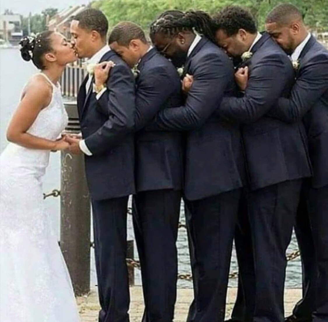 PositivelyBebes's tweet photo. He's paralyzed so his friends held him up on his wedding day. This is just awesome! https://t.co/sF93v5Jvm3