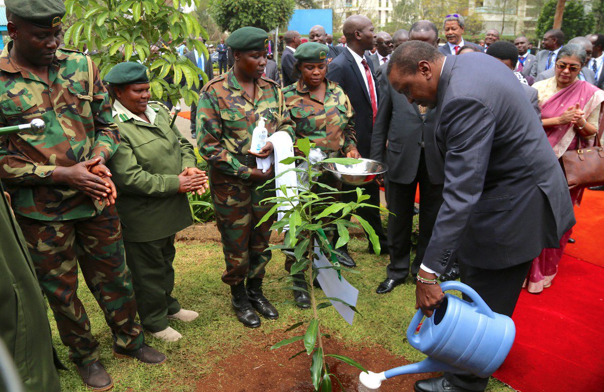 KeForestService's tweet photo. President Uhuru Kenyatta waters a tree he planted at Kenyatta National Hospital where he was launching a cancer &amp; radio therapy center. https://t.co/7vkUe6ML9q