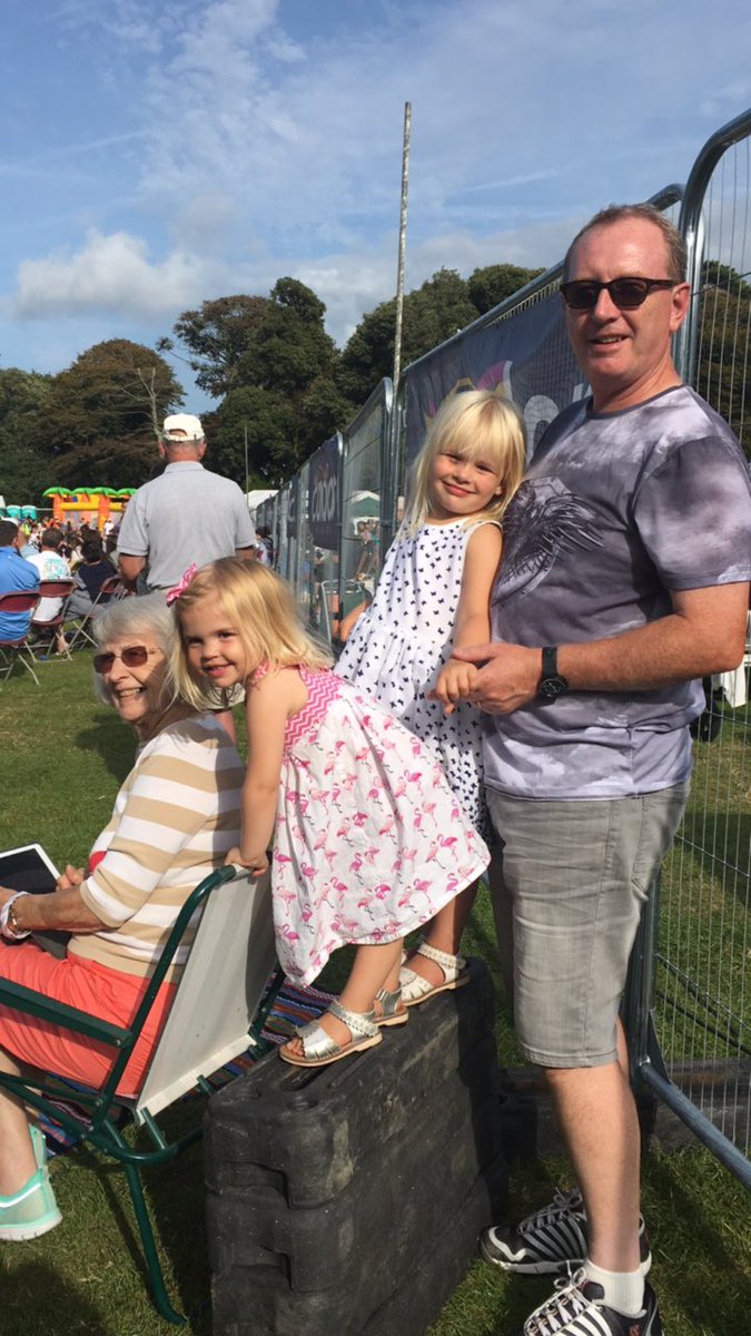 GuernseyPress's tweet photo. Families watching the float judging https://t.co/C3Hm1LW622
