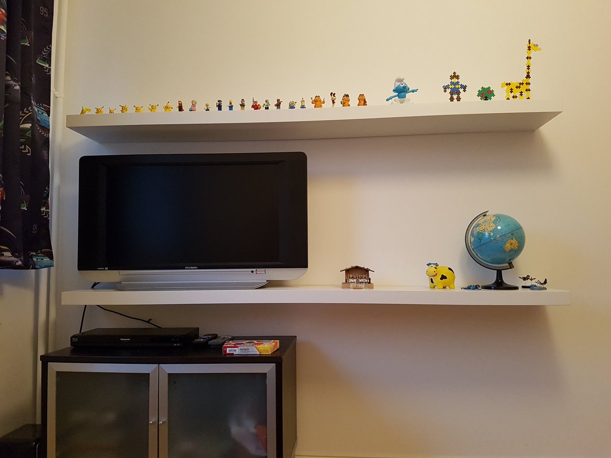 Srfsmurf's tweet photo. First wall done. I hope my son will appreciate the new shelves and a #Sun&Moon #PokemonTCG #TrainerKit 😊 https://t.co/iP7B7xc4Ji