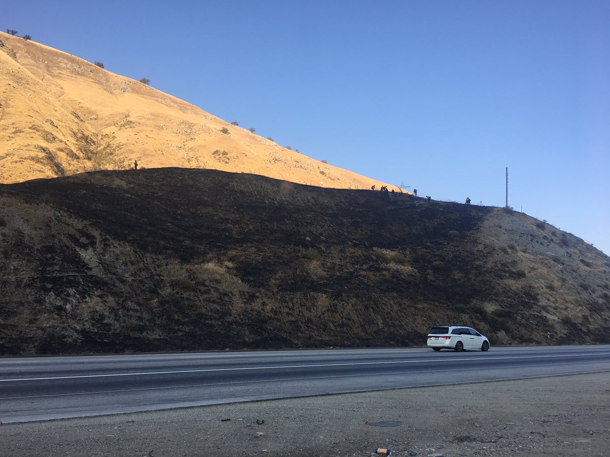 KristenWTAE's tweet photo. I-5 fire is being called the #SwitchFire. 14 acres/💯contained. Firefighters remaining in scene to clean up. @kerncountyfire https://t.co/kk926JuEWE
