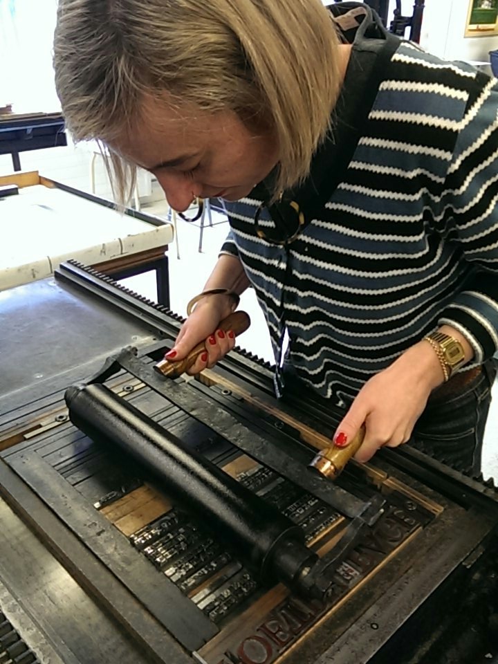 Everyone gets a turn inking and printing a copy of the found poem! Nice work! #NZPoetryDay