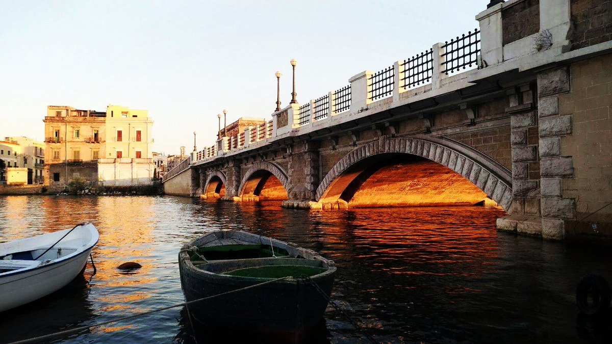 apuliaslowtrav's tweet photo. enjoying the silence of a beautiful sunset close to the 'Ponte di Pietra' bridge in beautiful #Taranto #sunset #Italy #WeAreinPuglia #summer https://t.co/99rGJLs33U