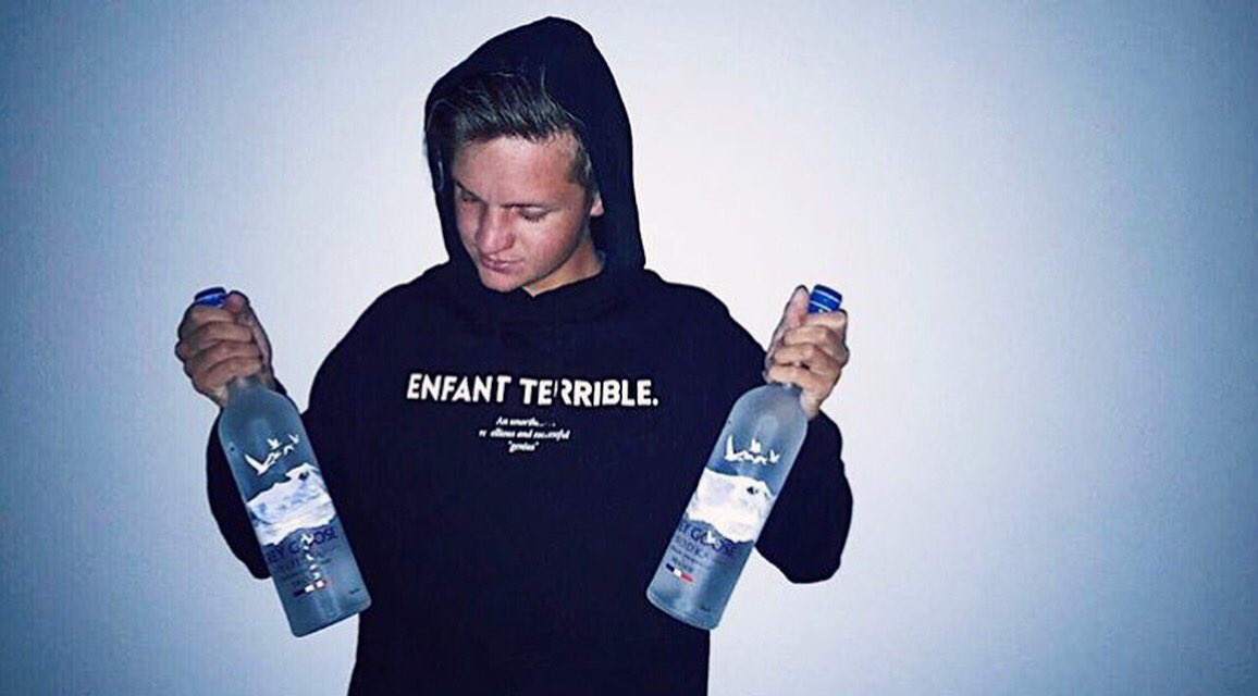 BadHabitClub's tweet photo. Grey Goose and the Enfant Terrible hoodie, Tim knows how to party in style! 🎉🍾 #badhabitclub #enfantterrible https://t.co/FBCWZgiax9