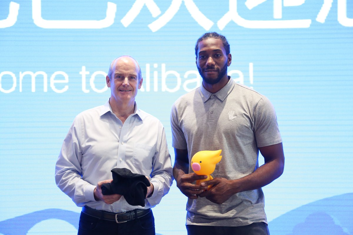 NBA's tweet photo. Kawhi Leonard meets with Michael Evans, President of Alibaba Group and received a VIP Tour of Alibaba’s Headquarters in Hangzhou, China. https://t.co/jNXsu6soKN