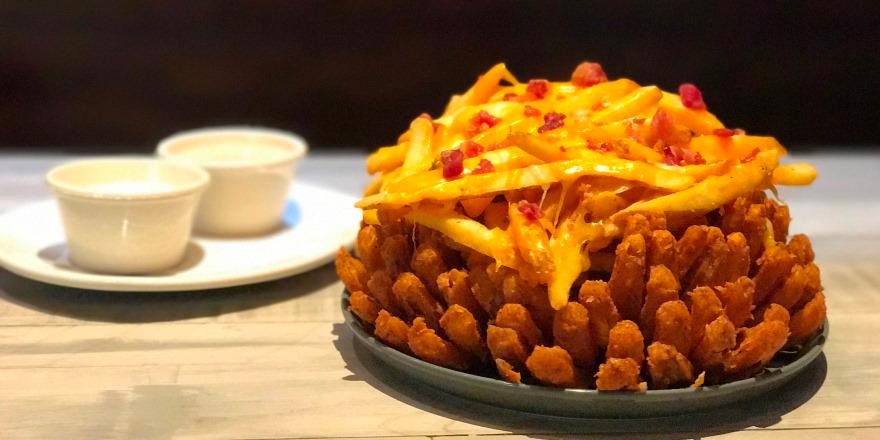 Outback's tweet image. All that cheese makes anyone's mouth water!