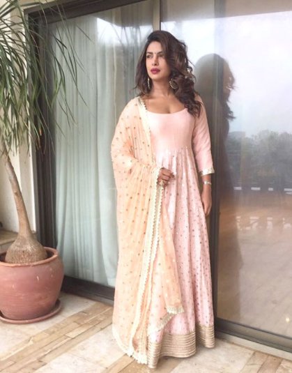 imdaugherty's tweet photo. #NayiSoch Pretty in Pink: Priyanka Chopra attends Arpita Khan’s Ganpati celebrations https://t.co/ERUbBD4Hwp https://t.co/4EbAWOGDrY