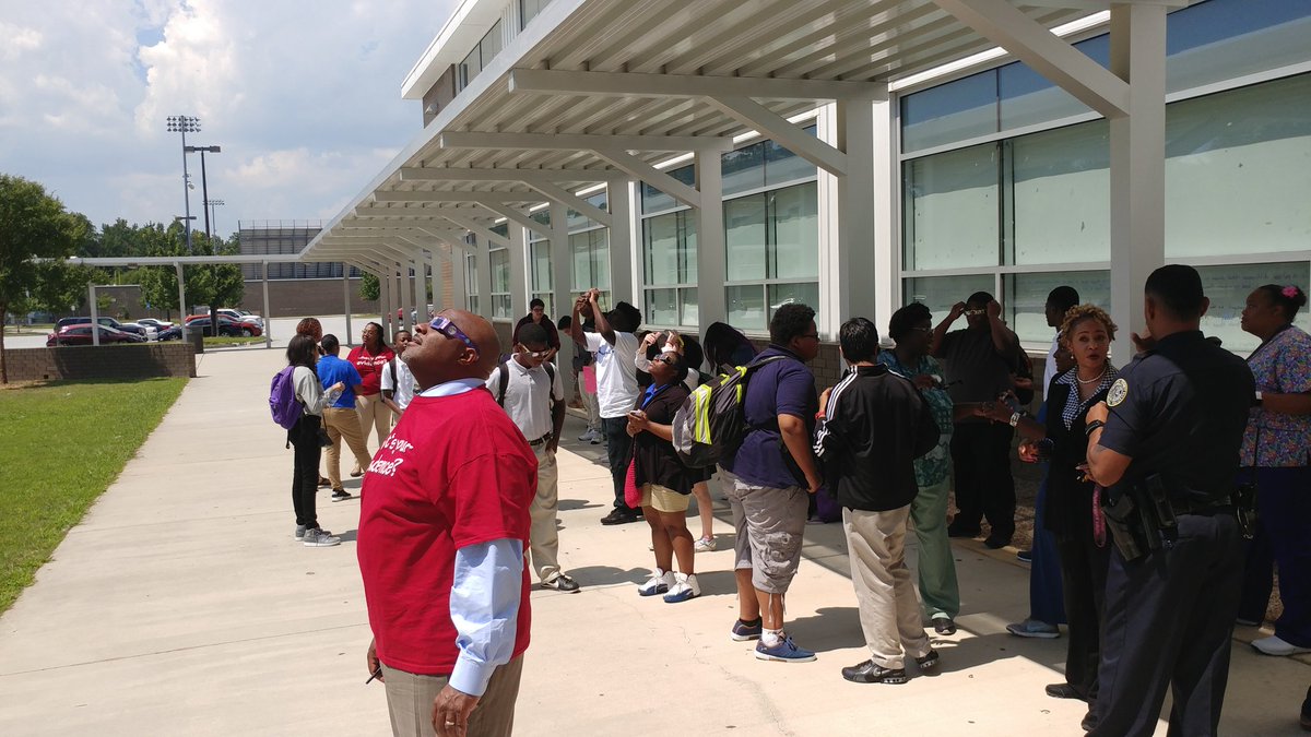 CharlesRDrewHS's tweet photo. Principal Gary Townsend, staff, and students view the solar eclipse https://t.co/IhriFBHvk2