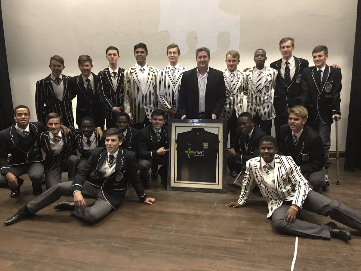 jeppeboys's tweet photo. The 1st team hockey boys present sponsor and old boy, Mr Phil Lewis, with a framed jersey at the annual hockey awards dinner https://t.co/zxHrb4mOlc
