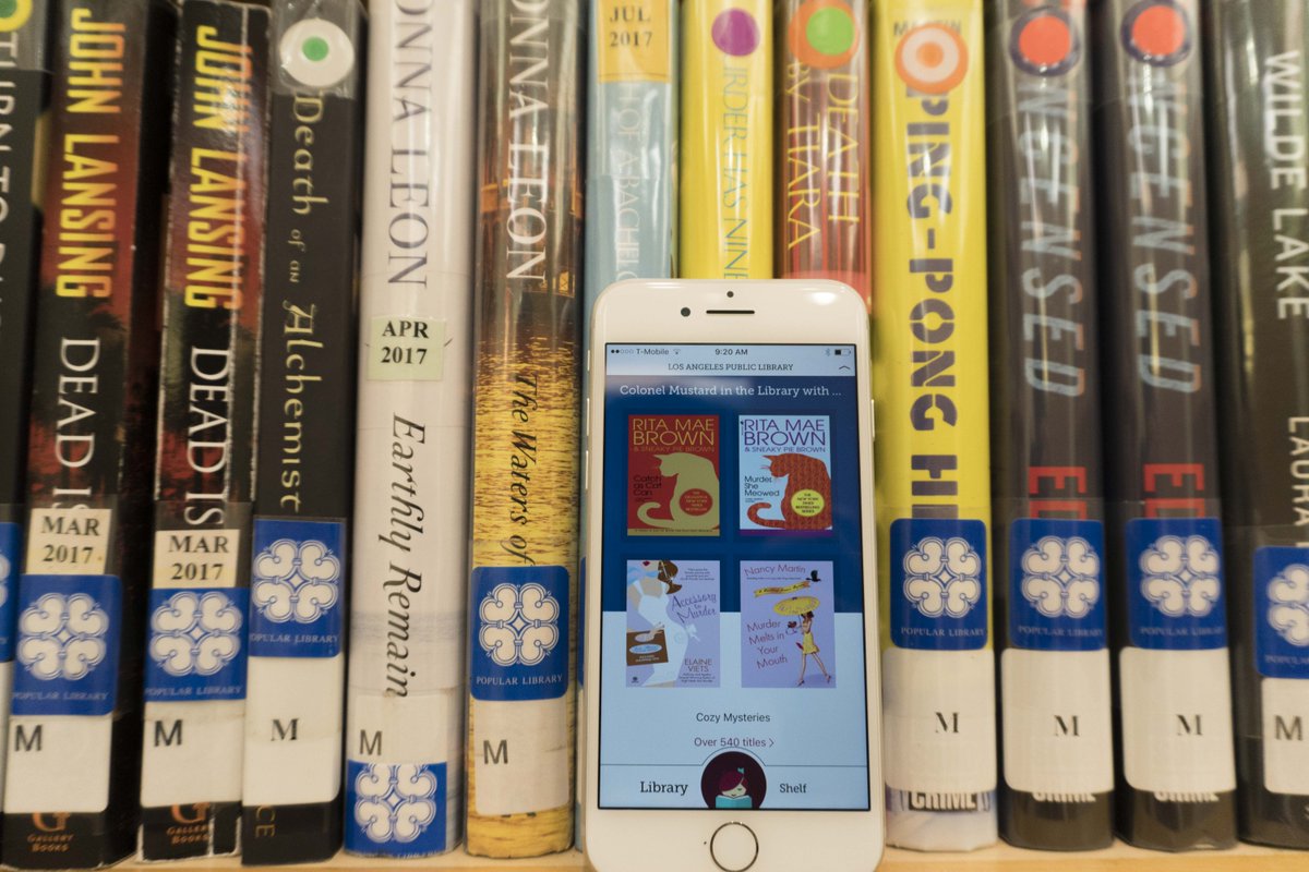 Phone in front of books