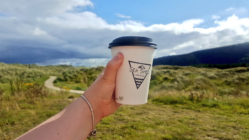 Random_Rax's tweet photo. #SeaShed Latte in hand. Time for a walk on #Benone Beach. https://t.co/r3iskeqXJb