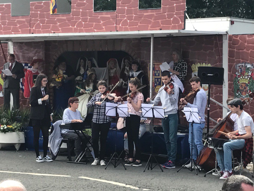 NACmusicservice's tweet photo. Greenwood Academy Folk Group performing at the Marymass Crowning Ceremony #nacmusic https://t.co/3PbUblAf8f