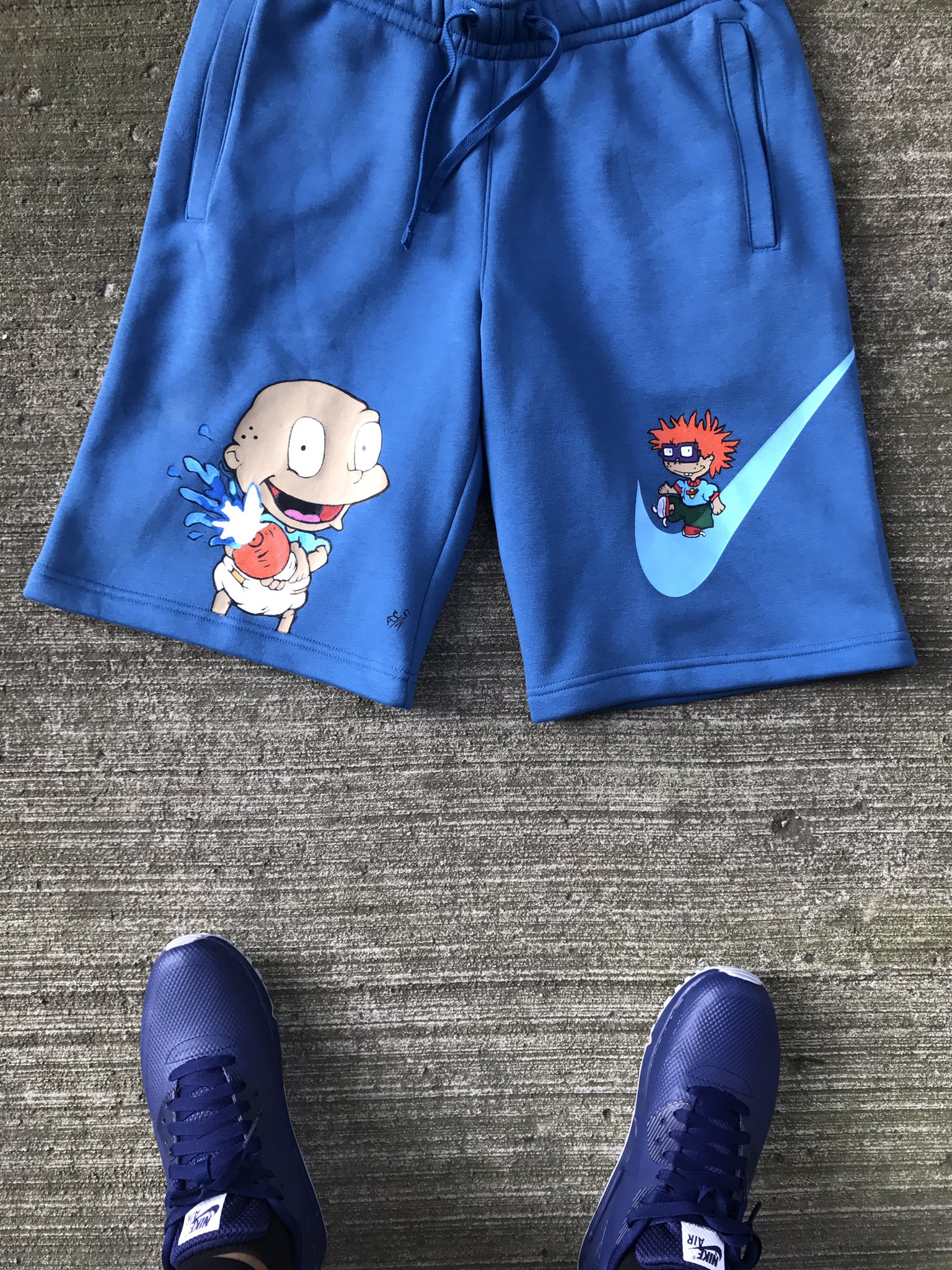 nike sweat shorts with cartoon characters