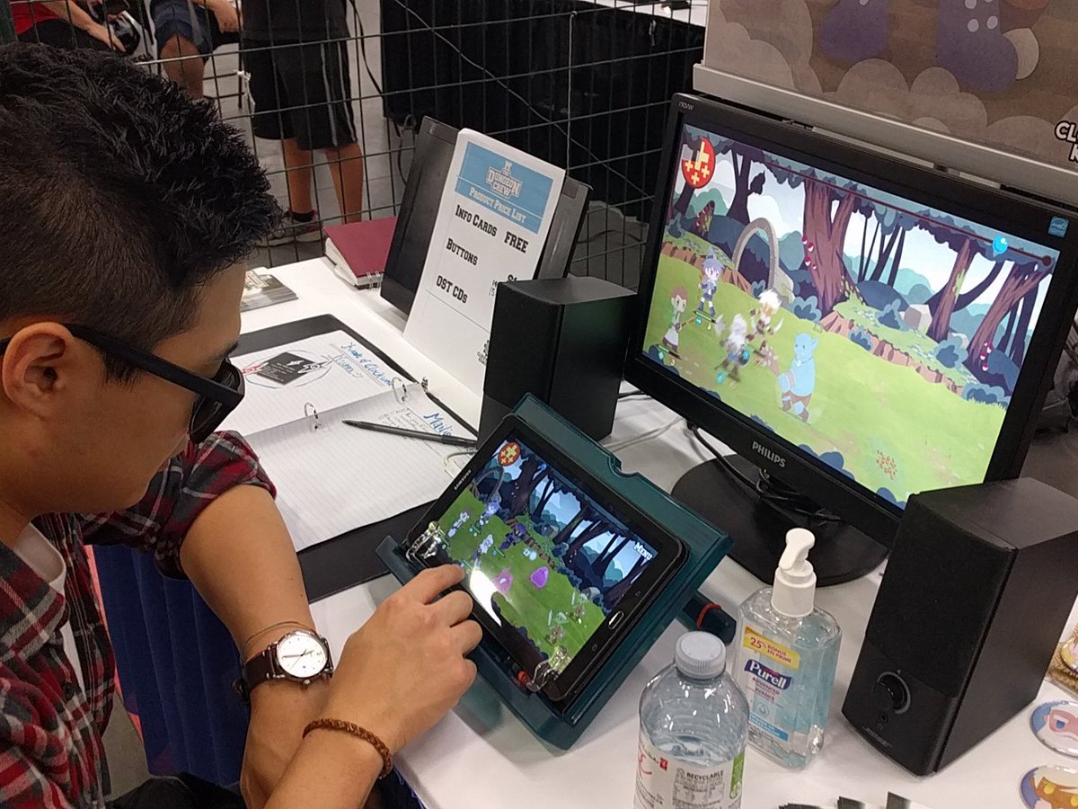 CWKraken's tweet photo. Day 2 of #BitBazaar at the #CNE! @BrianJuneYoon trying out #thedungeoncrew! #indiedev #gamedev https://t.co/HeDQlTjuYd