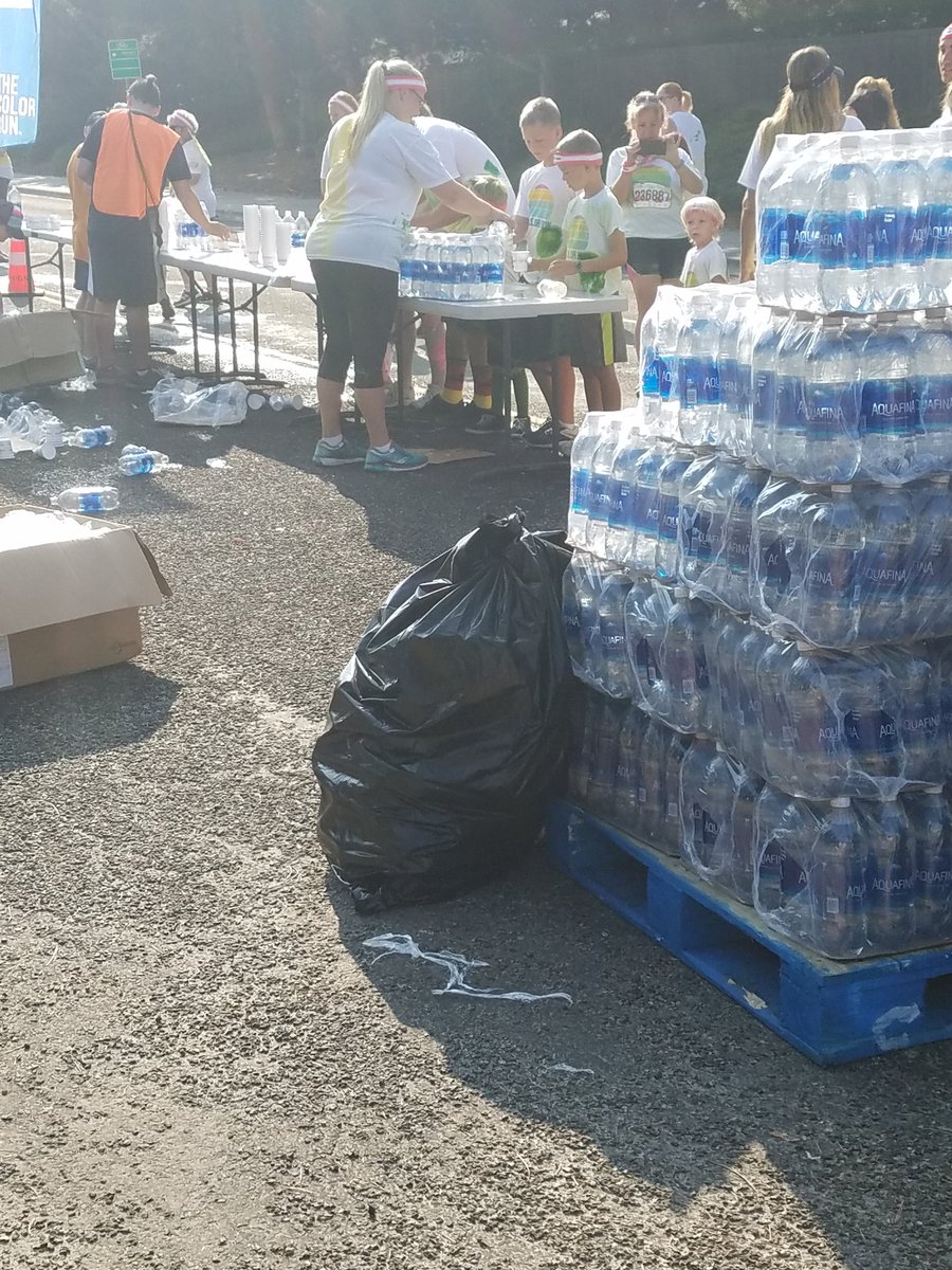 tweetavant's tweet photo. @Aquafina @TheColorRun That's a massive pile of plastic bottles of water being poured into plastic cups. #SaveTheEarth for future #colorruns https://t.co/cZtclL7Tuk