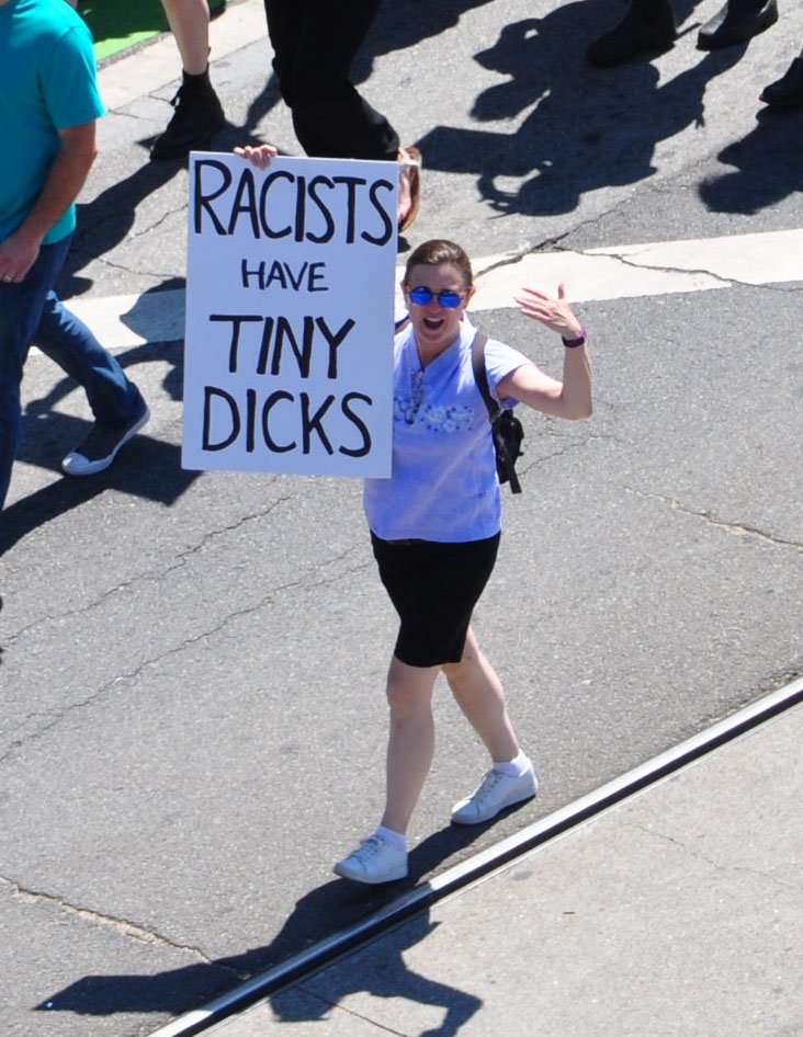 schock_designer's tweet photo. This chick wins the poster contest #racistshavetinydicks #SanFrancisco #protest #Resist https://t.co/PavNTAnlOA