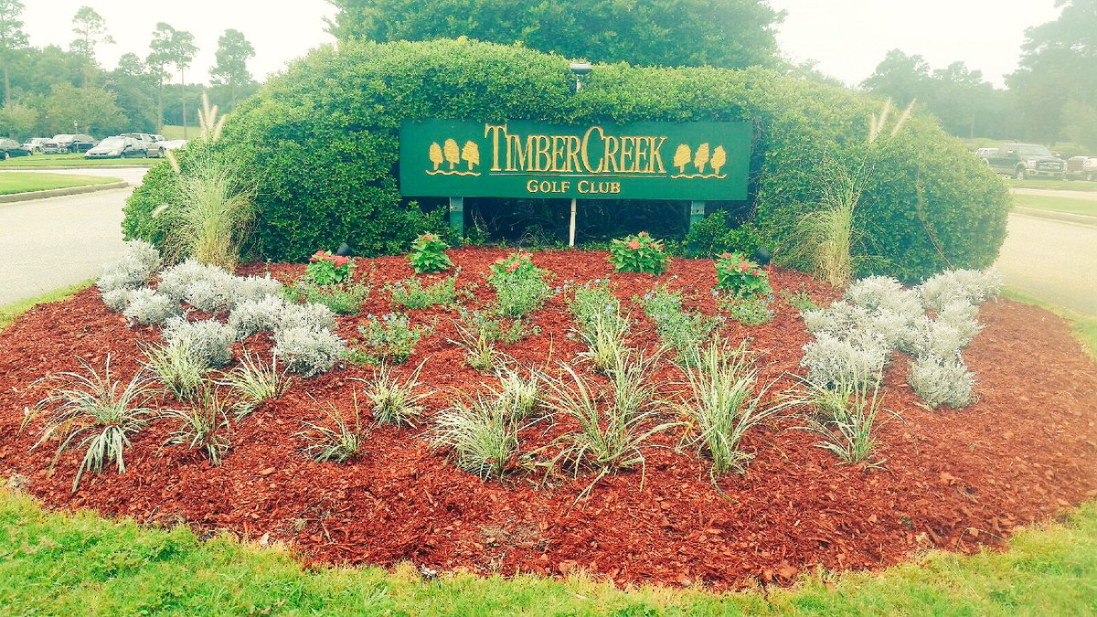 Timber1golf's tweet photo. Jake and guys reworked front sign this morning. Looking good for fall. Color and quality.#timberway https://t.co/V7A6Cw258V