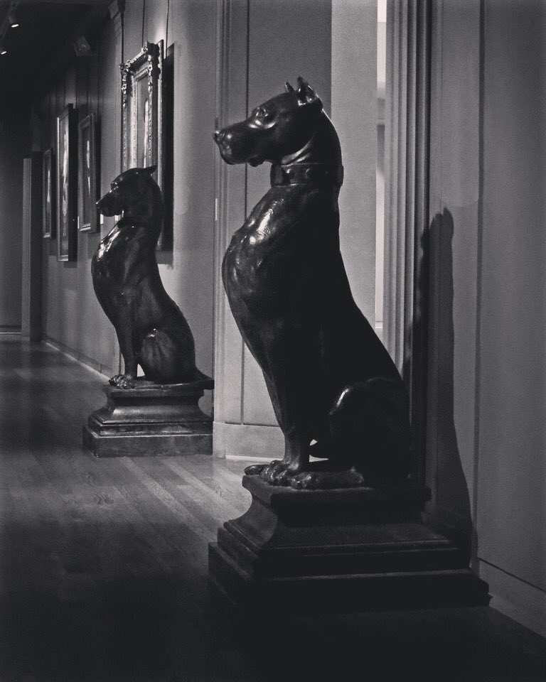 Philbrook's tweet photo. It's #NationalDogDay! These 2 Great Danes were the first objects acquired by @Philbrook. Their only trick is "sit." https://t.co/nVU2MnXZ23