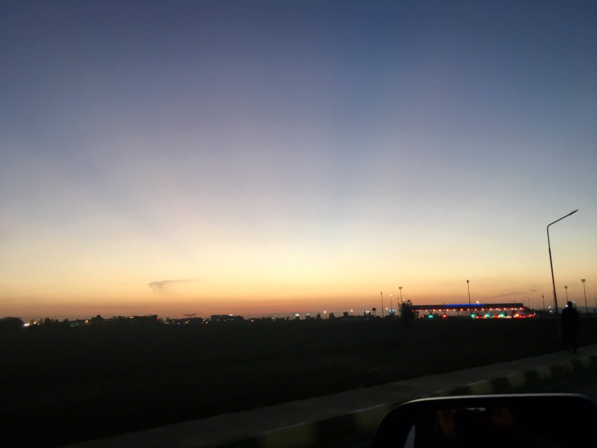 DrAhmedKalebi's tweet photo. Sunburst over the horizon behind JKIA's entrance at dawn @kenyapics https://t.co/Ks1Det3bs9
