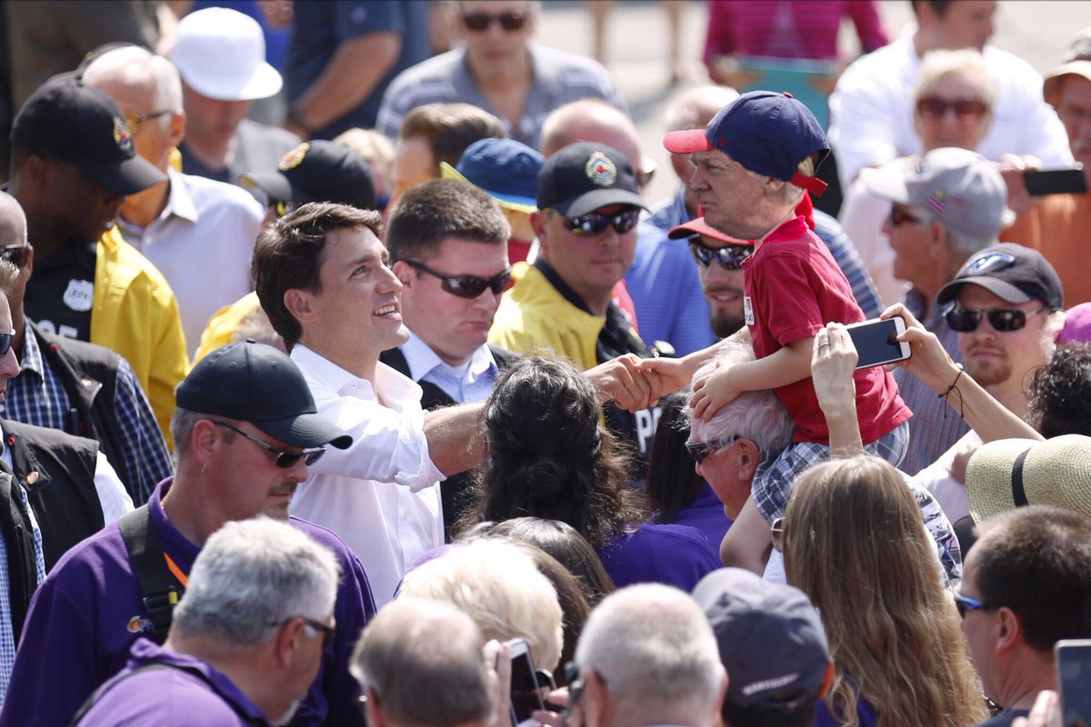 nathan__solo's tweet photo. . @JustinTrudeau  at the Winona Peach Festival, in Hamilton, greeting crowds. Even Tiny Trump made an appearance #tinytrumps https://t.co/5HlXQ7w8OY