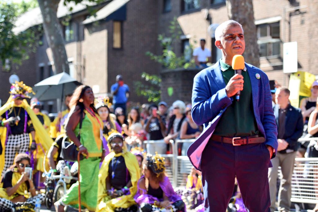 SadiqKhan's tweet photo. Standing alongside the community here at #NottingHillCarnival - which begins by honouring those who lost their lives at #GrenfellTower. https://t.co/11iDsXzoH2