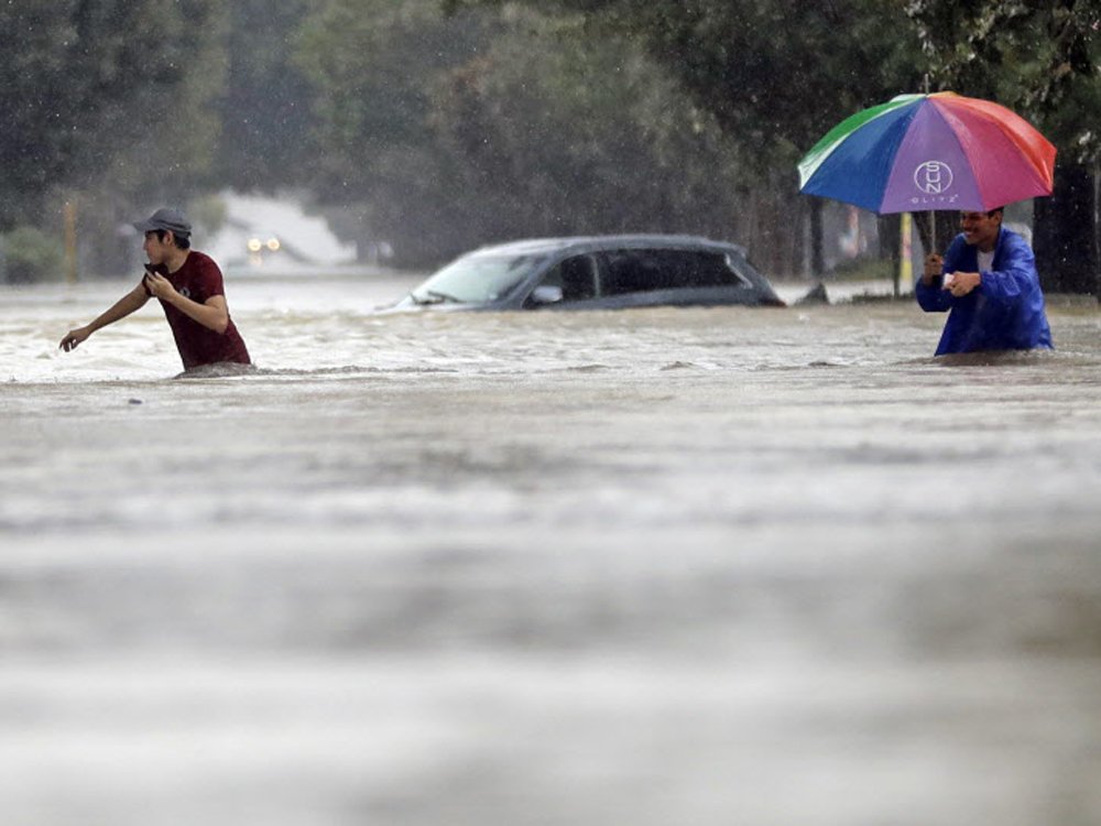 nationalpost's tweet photo. Water 'is swallowing us up': Catastrophic floods hit Houston https://t.co/IfsoACyJ02 https://t.co/OArGmhMcuE