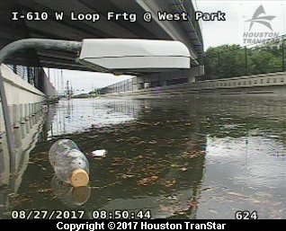 wxbrad's tweet photo. This is insane this is a traffic camera at the height of the street lights almost underwater in #Houston. #Flood #Harvey https://t.co/45s3NGUUjF