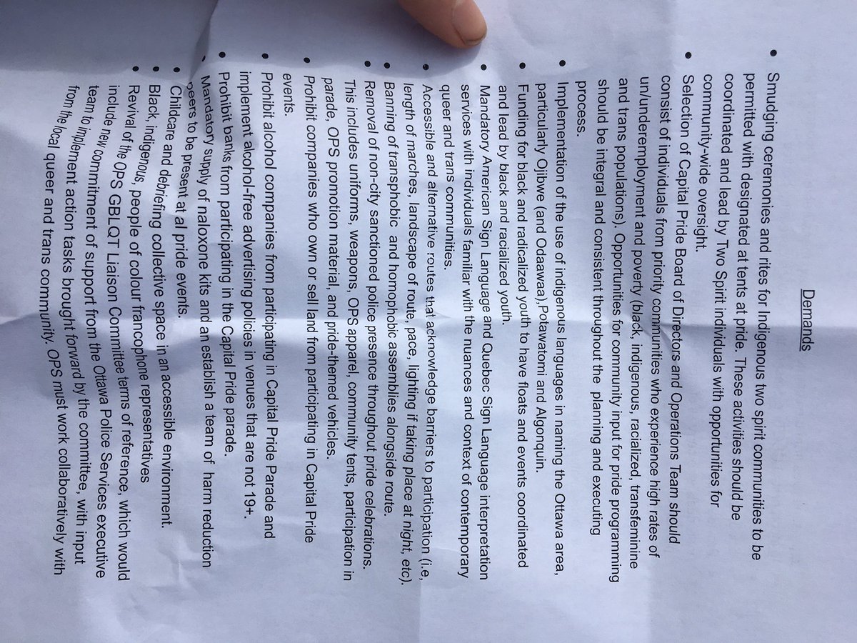 AnnieClaireBO's tweet photo. Crowd chanting "Black Lived Matter." Thane Robyn, with reclaiming our pride, giving Capital Pride organizers this list of demands: https://t.co/WJPkwdJysc
