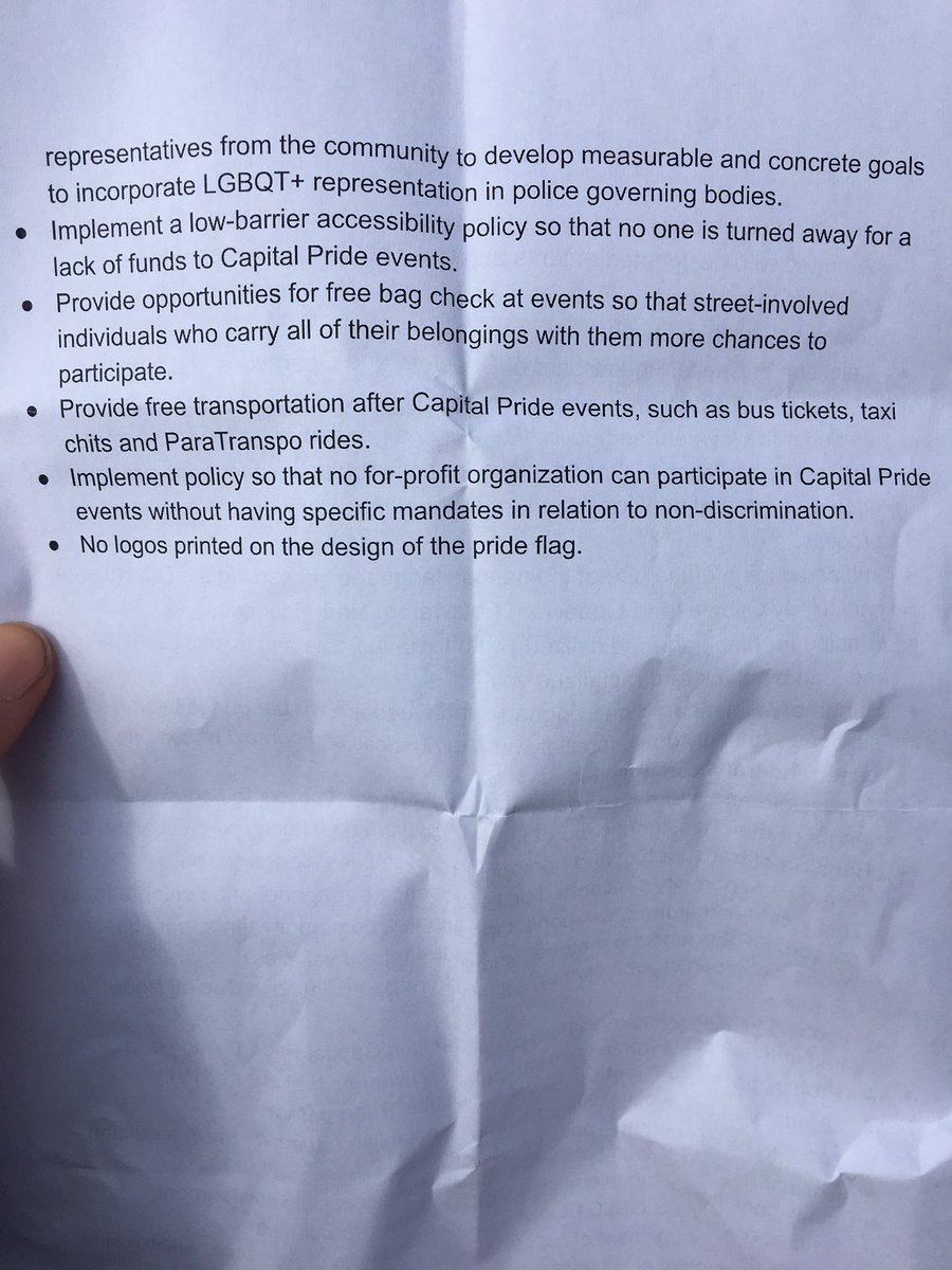 AnnieClaireBO's tweet photo. Crowd chanting "Black Lived Matter." Thane Robyn, with reclaiming our pride, giving Capital Pride organizers this list of demands: https://t.co/WJPkwdJysc