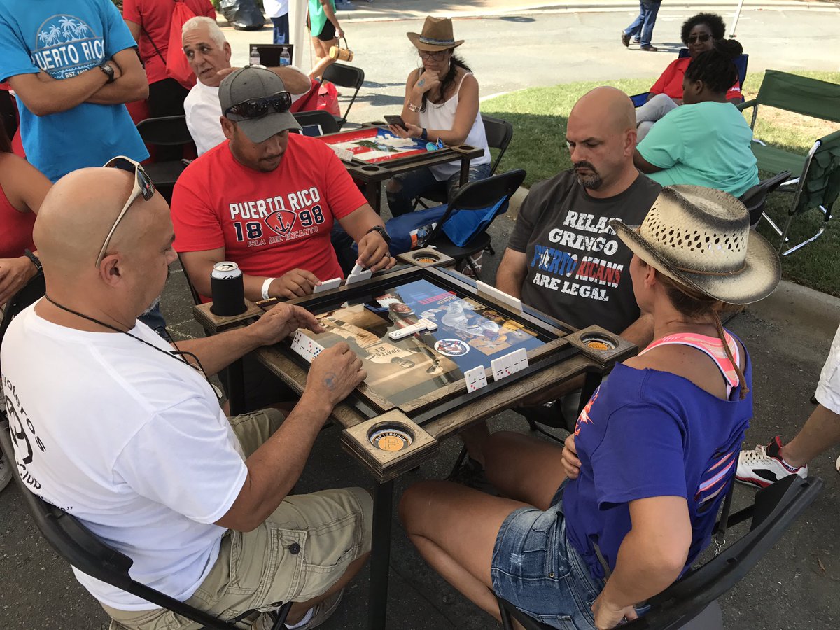 NCespanol's tweet photo. @AARPCLT the Finals of the @AARP #Domino Tournament at #PuertoRicanFestival2017 in #Charlotte https://t.co/kuHrMktKPI