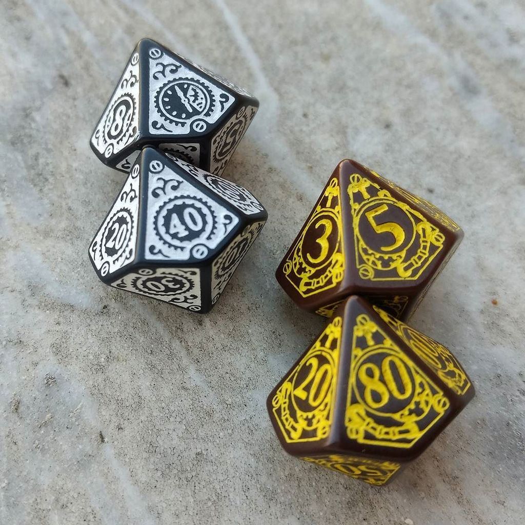 ArturoBenzi's tweet photo. Steampunk love ❤🎲 #gdr #rpg #dadi #dice #tech #techdice #qworkshop #qwdice #polyhedraldice #polyset #omnissiah #im… https://t.co/F3ODTV8uGb https://t.co/4Eebpc8Kq2