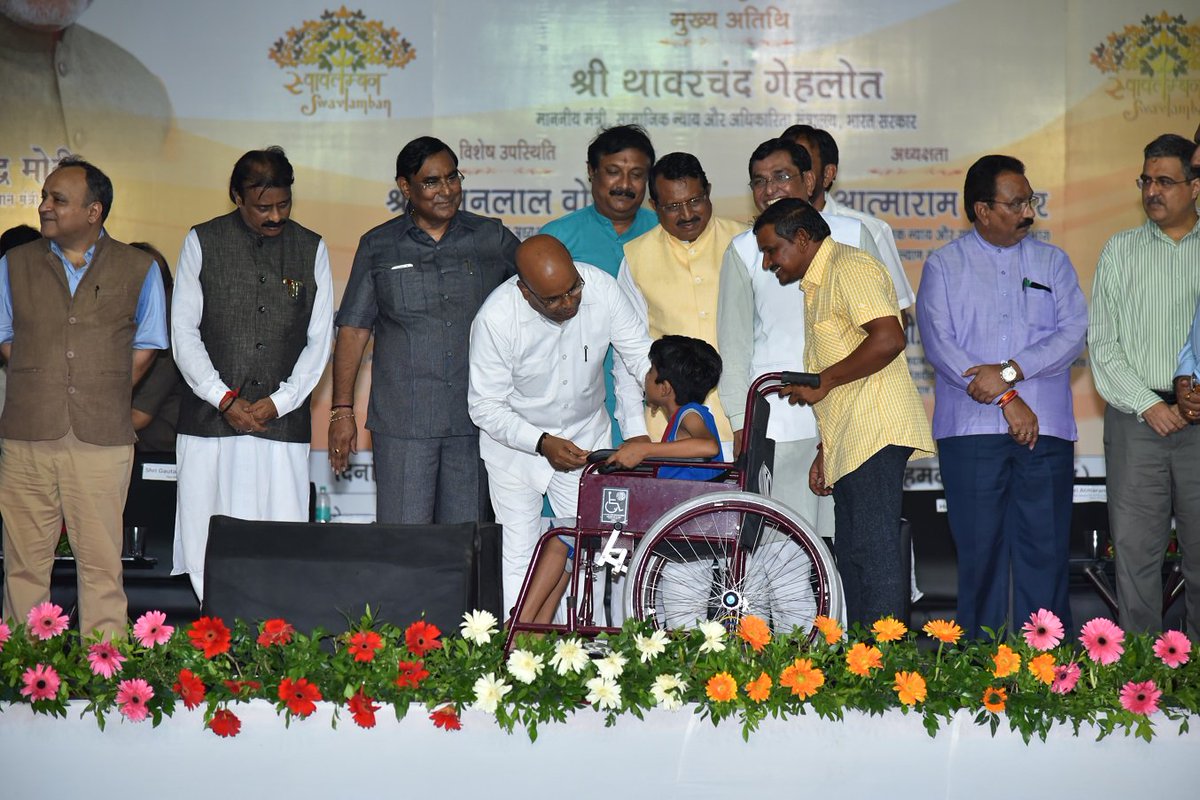 ALIMCOHQ's tweet photo. Hon'ble Minister @TCGEHLOT distributing wheelchair in a Mega Distribution camp organised in Ahmadabad on 27.08.17. Total 2788 beneficiaries https://t.co/oxj6yhPtGw
